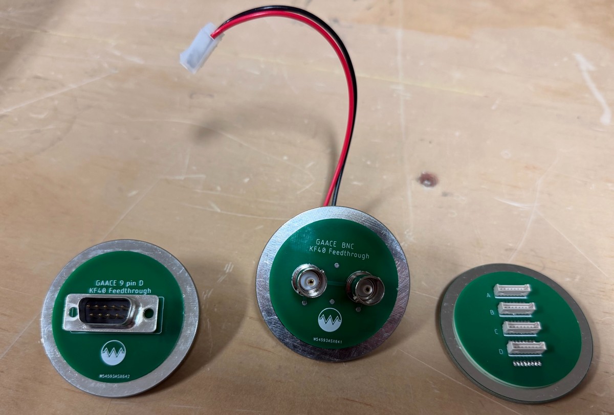 GAACE PCB KF vacuum feedthroughs — D9, BNC, and Picoblade connector variants side by side, KF40 flange size shown
